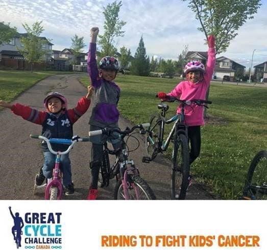 three children pumping their fists in the air with tag line 'riding to fight kids' cancer'
