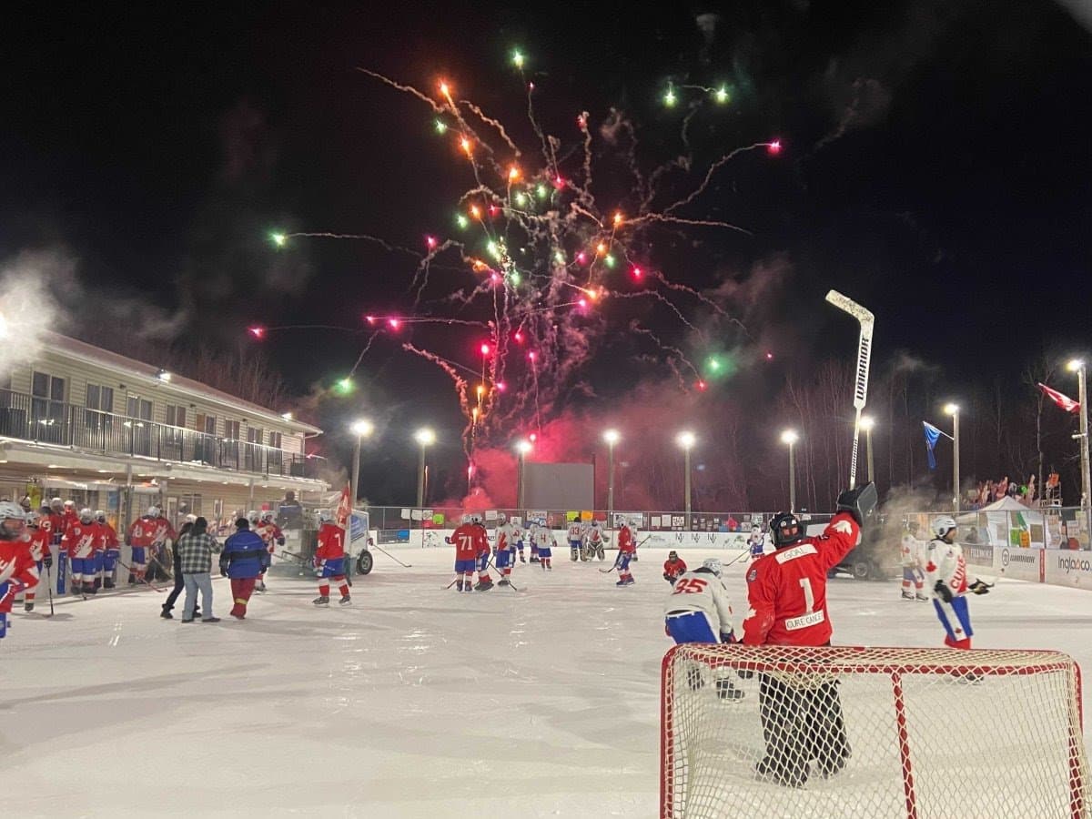 skating rink with fireworks and hockey players