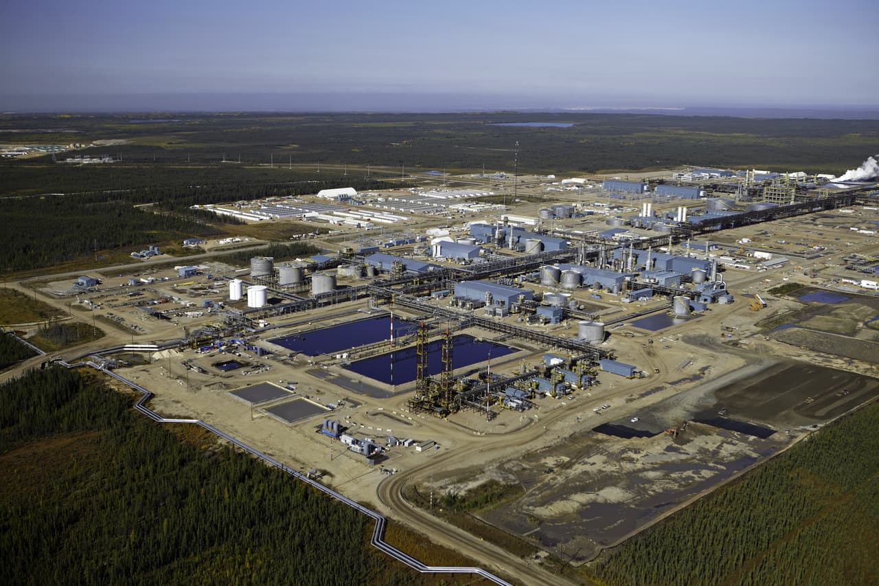 An aerial image of Suncor’s Firebag in situ oil sands facility showing various buildings, equipment and piping.