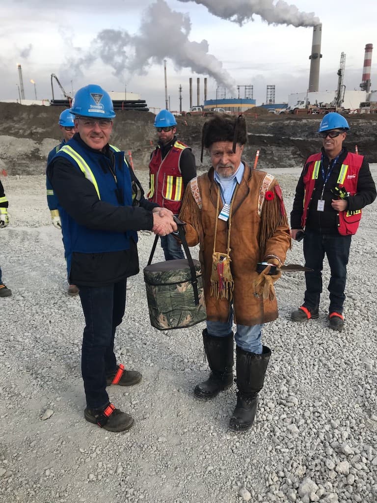 A traditional Indigenous smudging ceremony at Suncor construction site