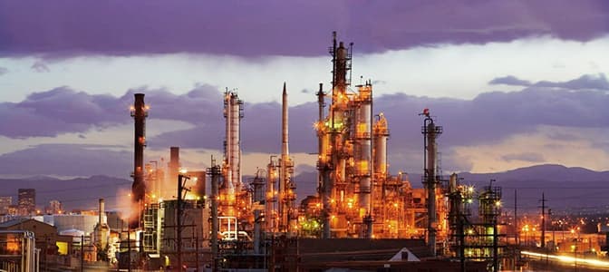 Photo of a refinery plant at dusk